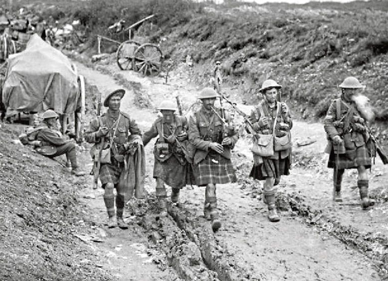 Bagpiper leading exhausted troops during WWI